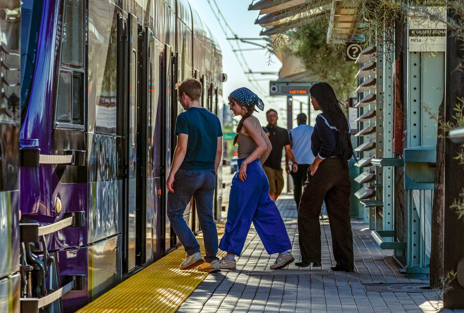 People Boarding Lightrail